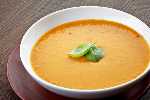 roast pumpkin soup in white bowl