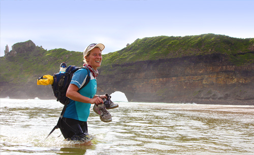 Women standing in river on an adventure at Umngazi