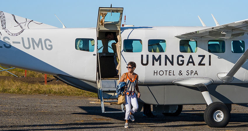 Umngazi plane for Flying in with a guest getting off the plane. Part of how to get to Umngazi from Cape Town