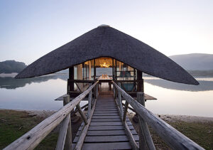 A bridge leading to a bungalow